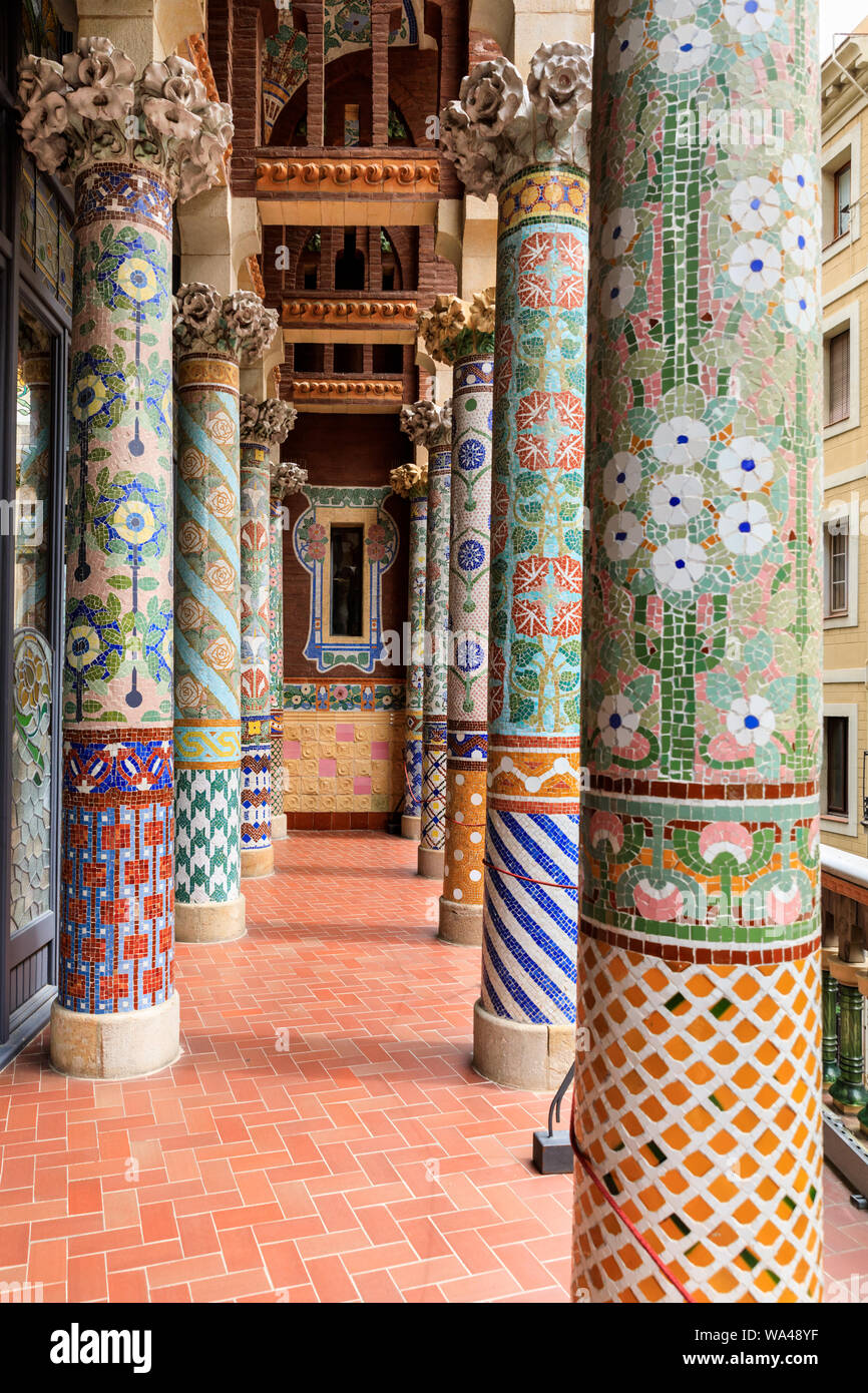 Colourful mosaic tile and glass pattern pillars, balcony of Palau de la Música Catalana Barcelona, Catalonia, Spain Stock Photo