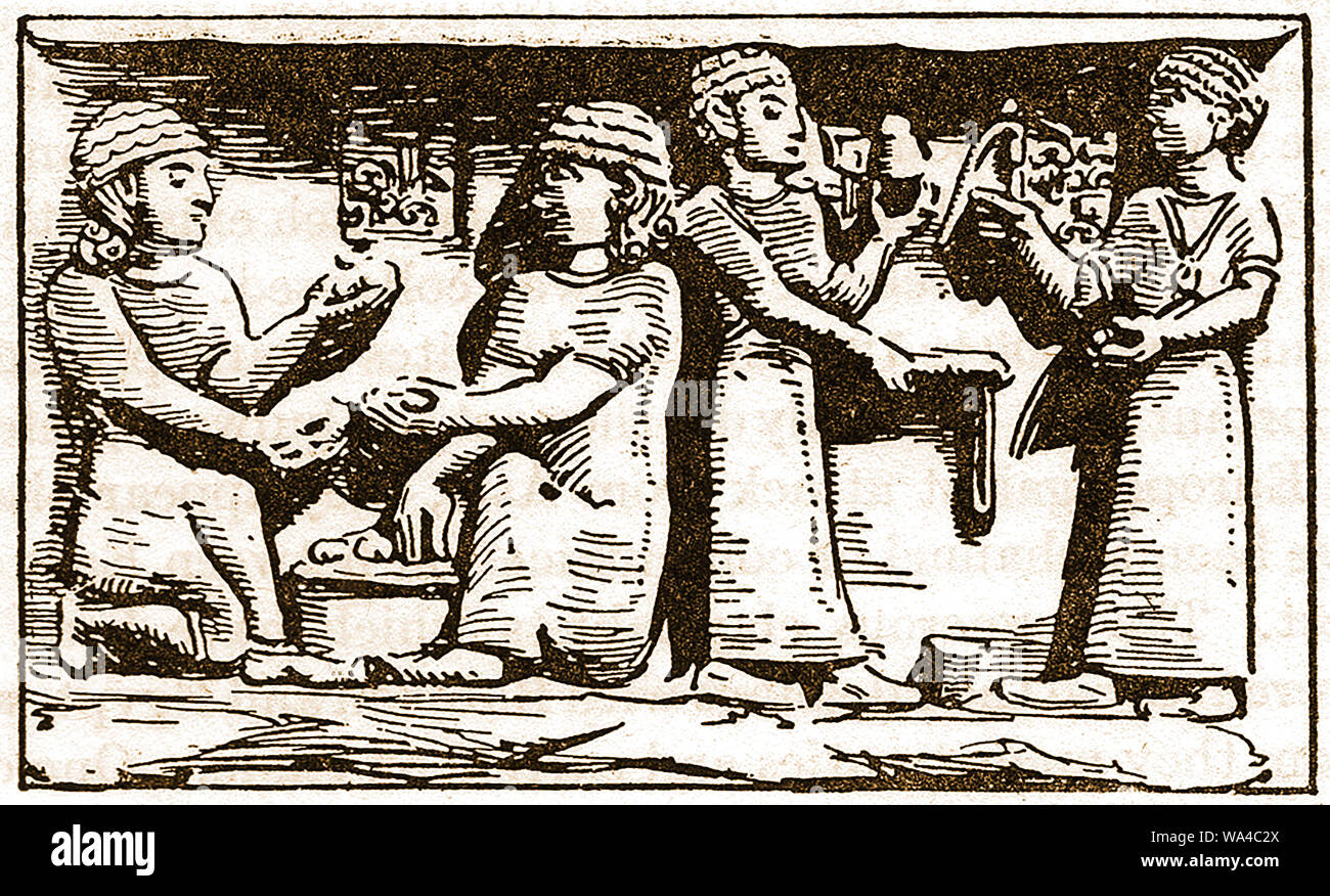 HISTORY OF CHILDREN'S GAMES & TOYS  - Carchemish (aka  Karkemish and Karkamiš  ) Syria- A frieze showing Hittite children at play with knucklebones (aka Tali, Fivestones, or Jacks) and spinning  tops. Fivestones were also used for fortune telling Stock Photo