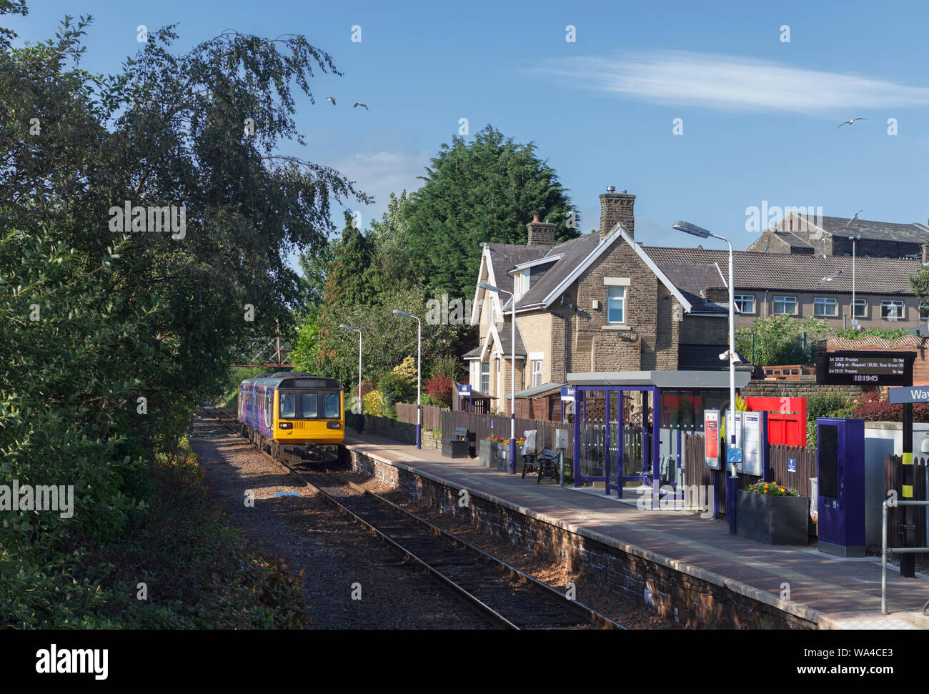 Arriva Northern Rail class 142 pacer train calling at Brierfield station on the single  track Colne line in Lancashire Stock Photo