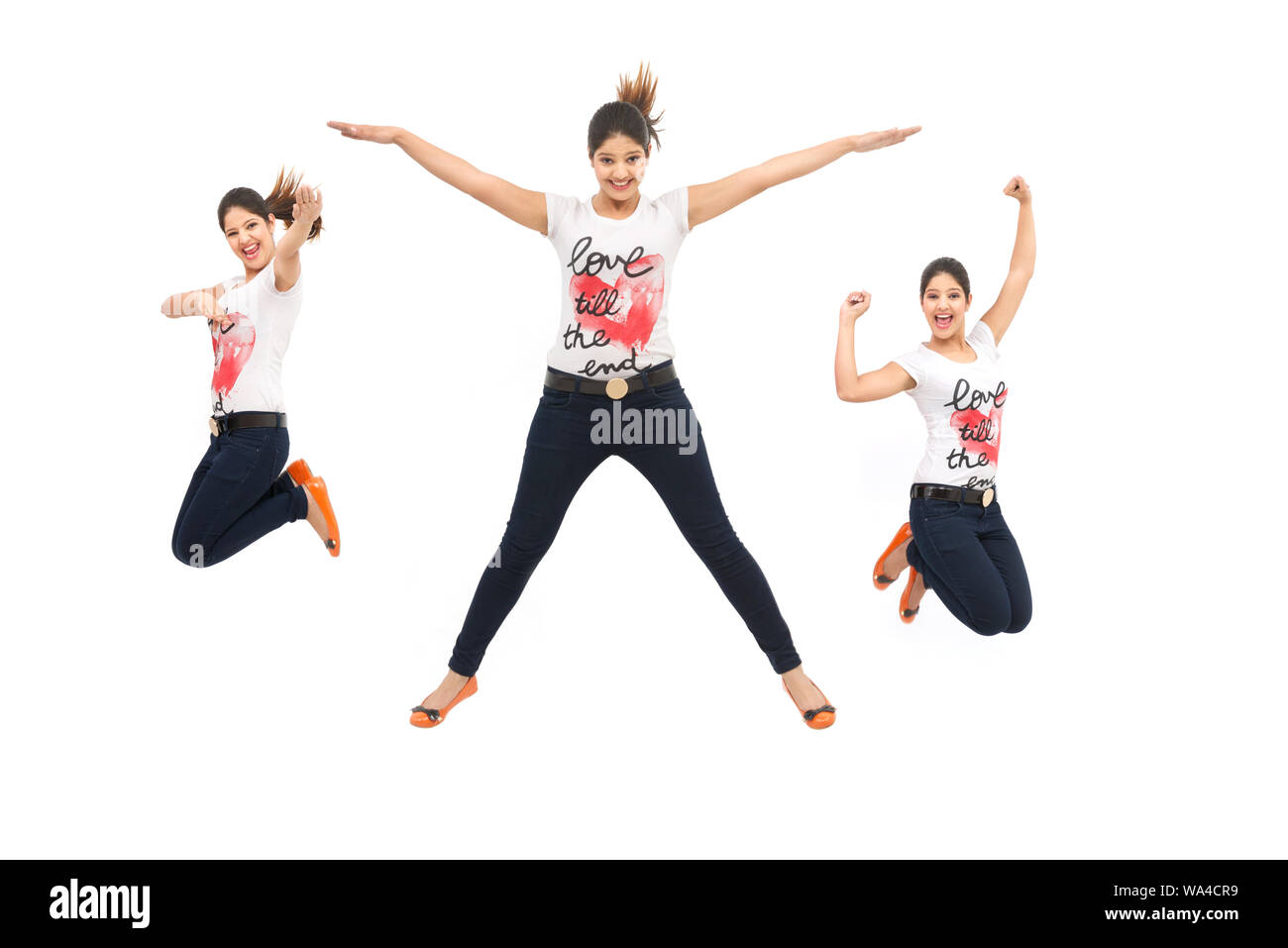 Multiple images of a young woman jumping in air Stock Photo