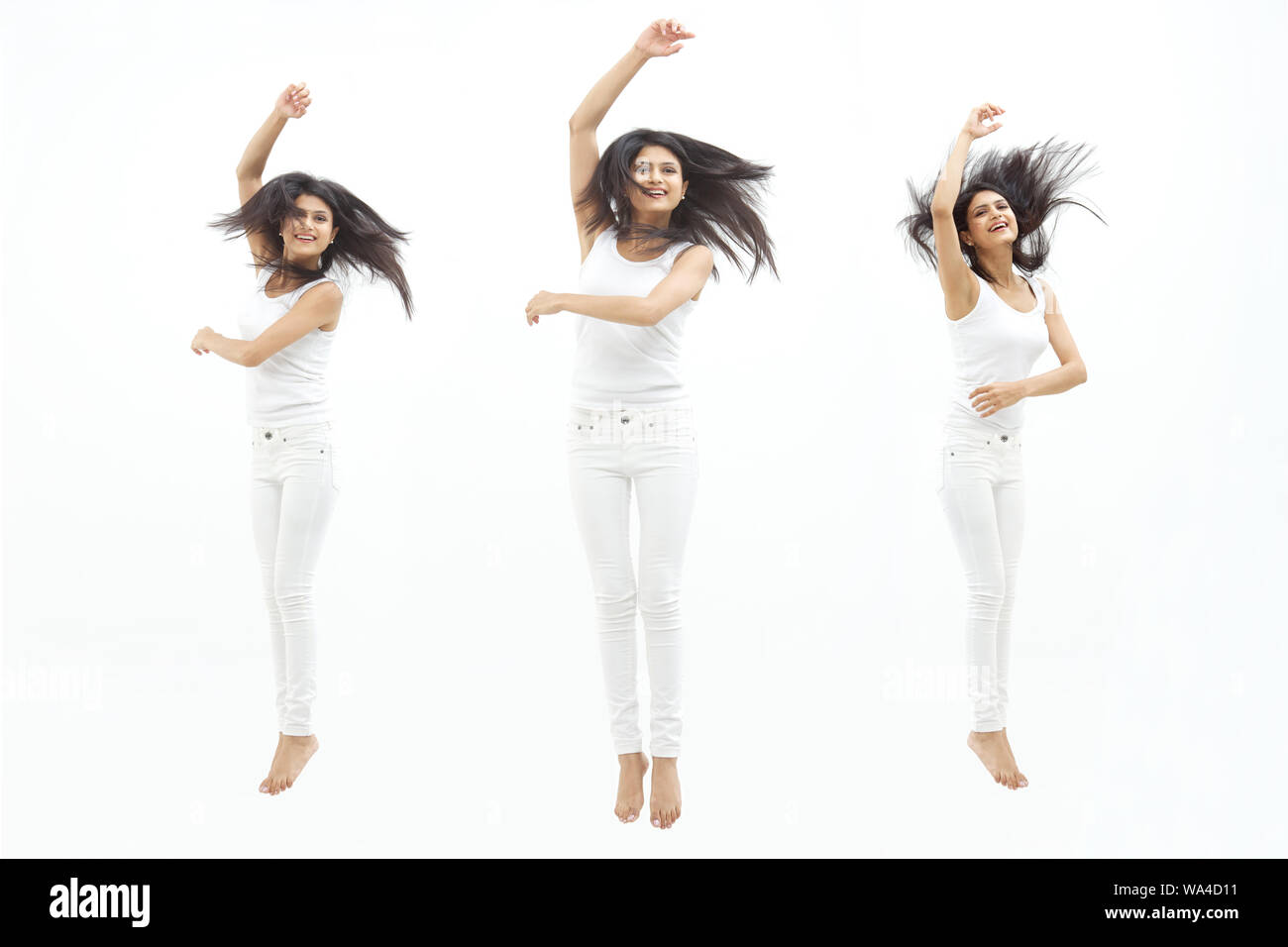 Multiple images of a young woman jumping in air Stock Photo - Alamy