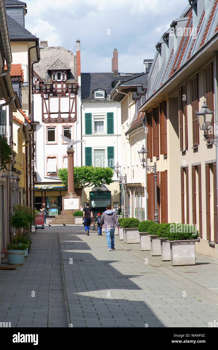 Bad Homburg, Germany - June 09, 2019: A narrow alley with old historic houses overlooking the Waisenhaus Square on June 09, 2019 in Bad Homburg. Stock Photo