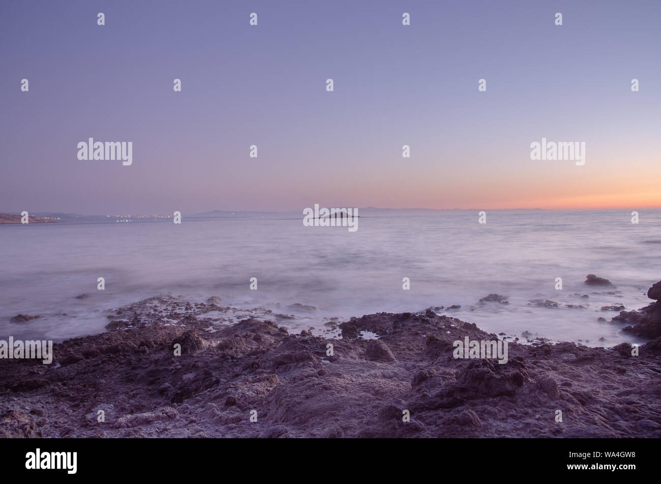 The sunset under the beautiful blue sky on beach Stock Photo - Alamy