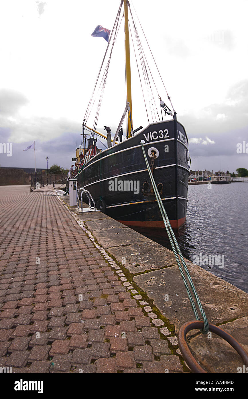 VIC 32 is the last seagoing coal fired steam 'Clyde Puffer'. She was built in 1943 and has been well known for the last 30 years on the West Coast of Stock Photo