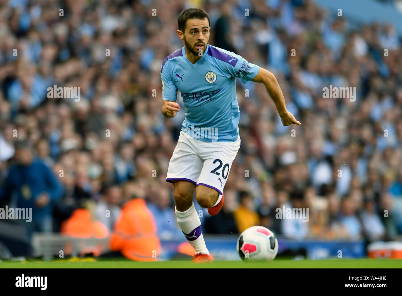 17th August 2019; Etihad Stadium, Manchester, Greater Manchester, England; Manchester City versus Tottenham Hotspur; Bernardo Silva of Manchester City breaks forward with the ball - Strictly Editorial Use Only. No use with unauthorized audio, video, data, fixture lists, club/league logos or 'live' services. Online in-match use limited to 120 images, no video emulation. Stock Photo