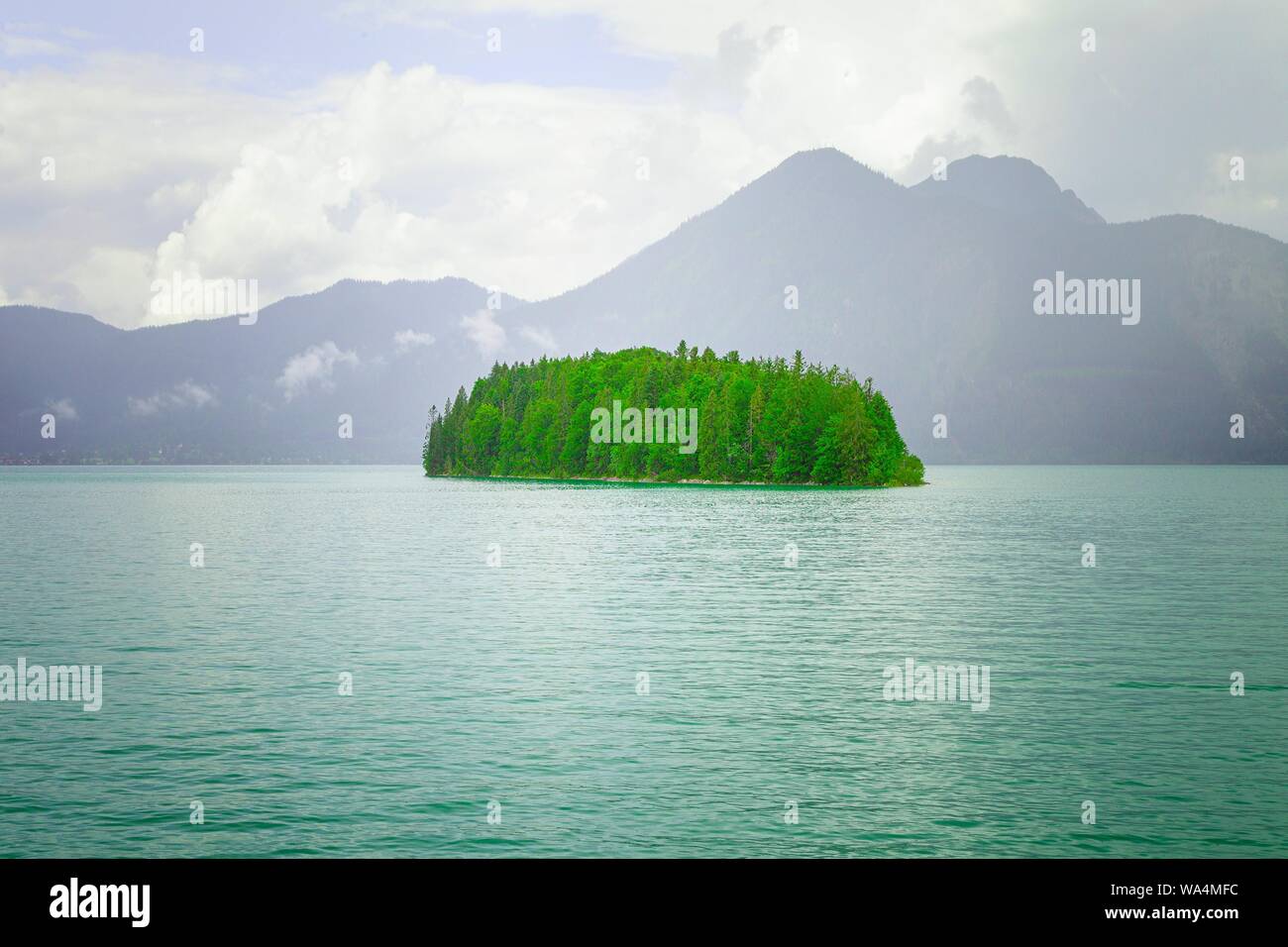 Green Island and a turquoise coloured lake in Upper Bavaria (Walchensee) Stock Photo