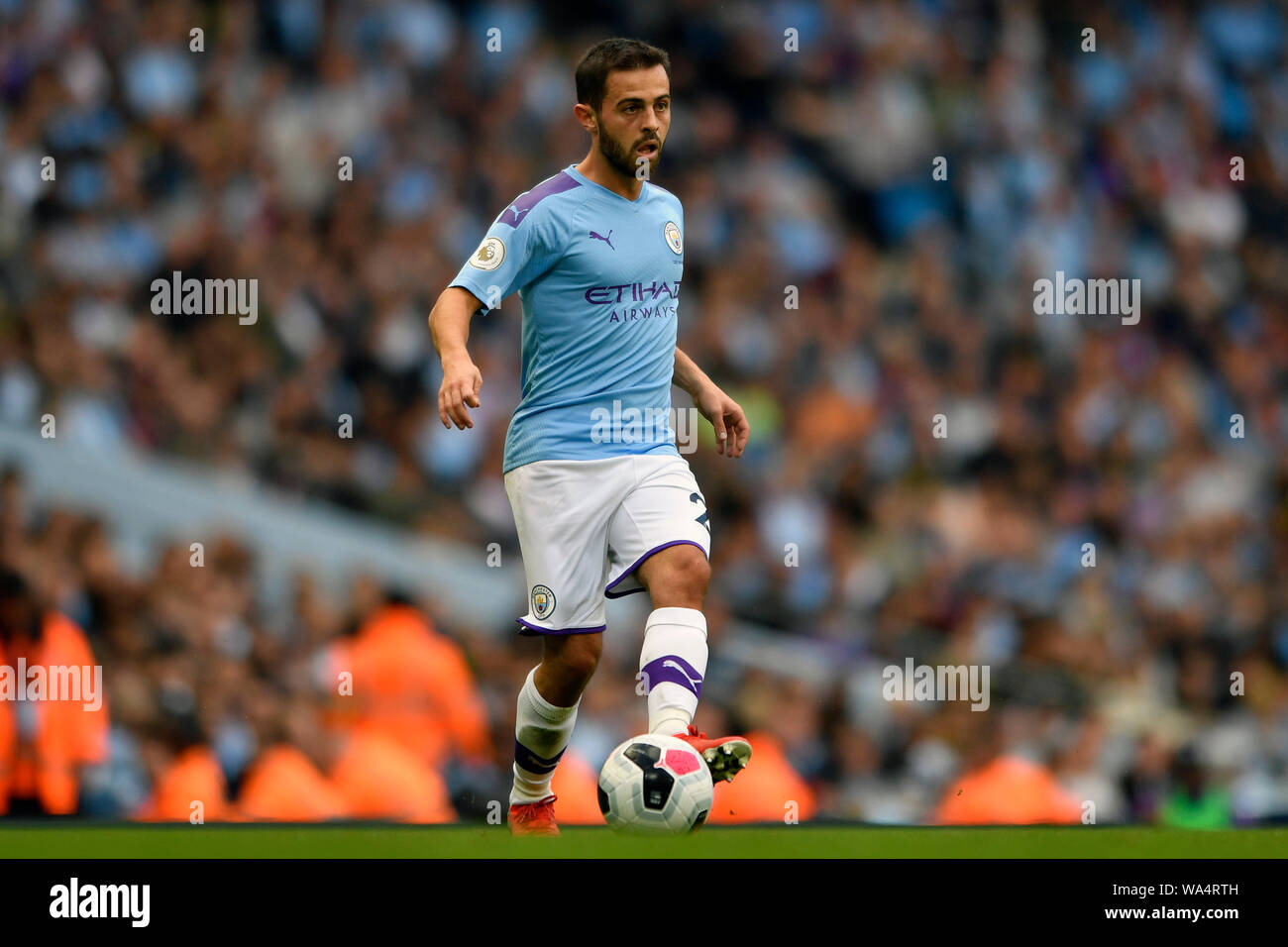 17th August 2019; Etihad Stadium, Manchester, Greater Manchester, England; Manchester City versus Tottenham Hotspur; Bernardo Silva of Manchester City makes a forward pass - Strictly Editorial Use Only. No use with unauthorized audio, video, data, fixture lists, club/league logos or 'live' services. Online in-match use limited to 120 images, no video emulation. Stock Photo