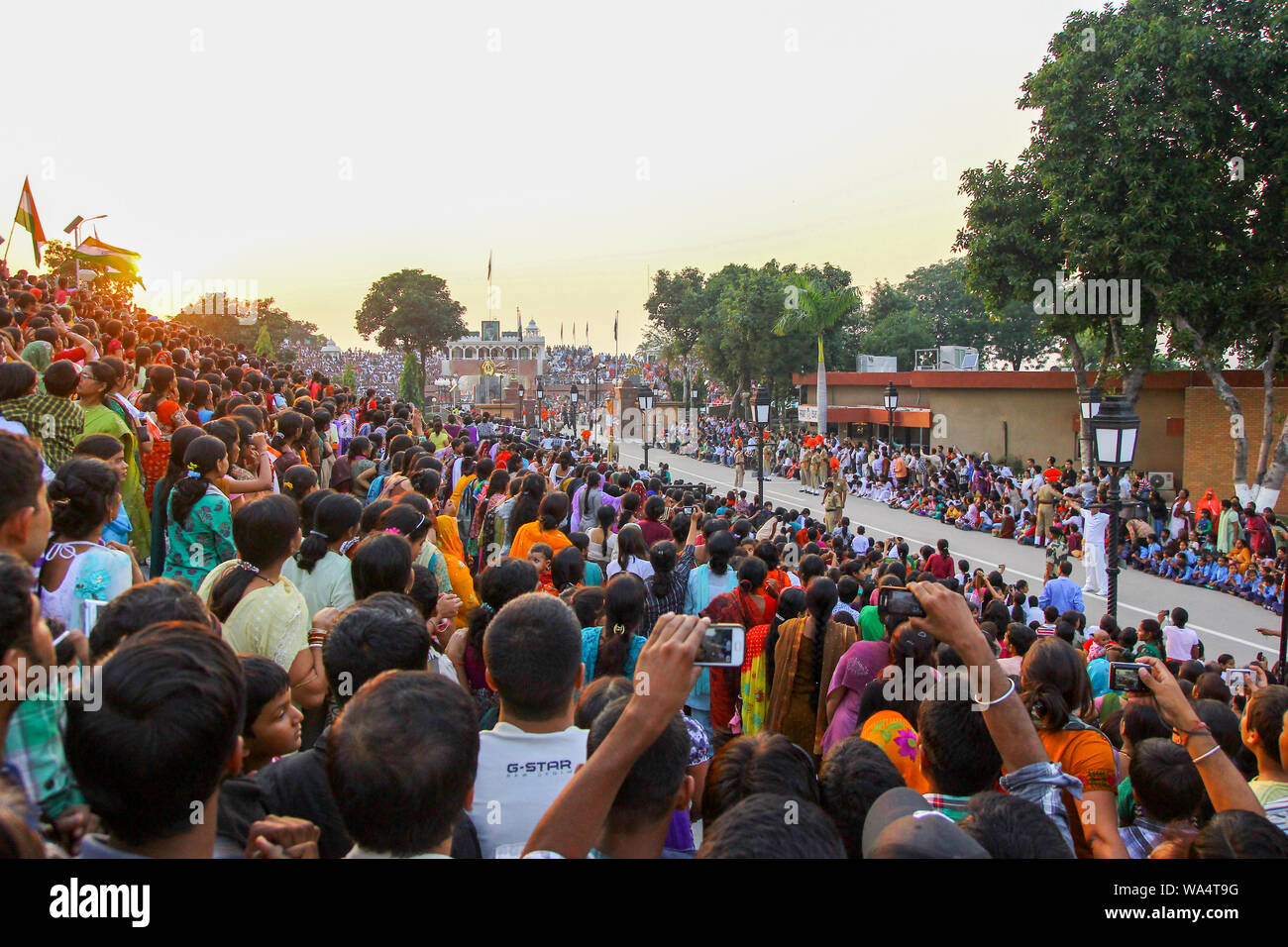 August 15,2018, Wagha Border, Amritsar, India. Indian crowd cheering and celebrating Indian Independance day event performed by Border Security Force Stock Photo
