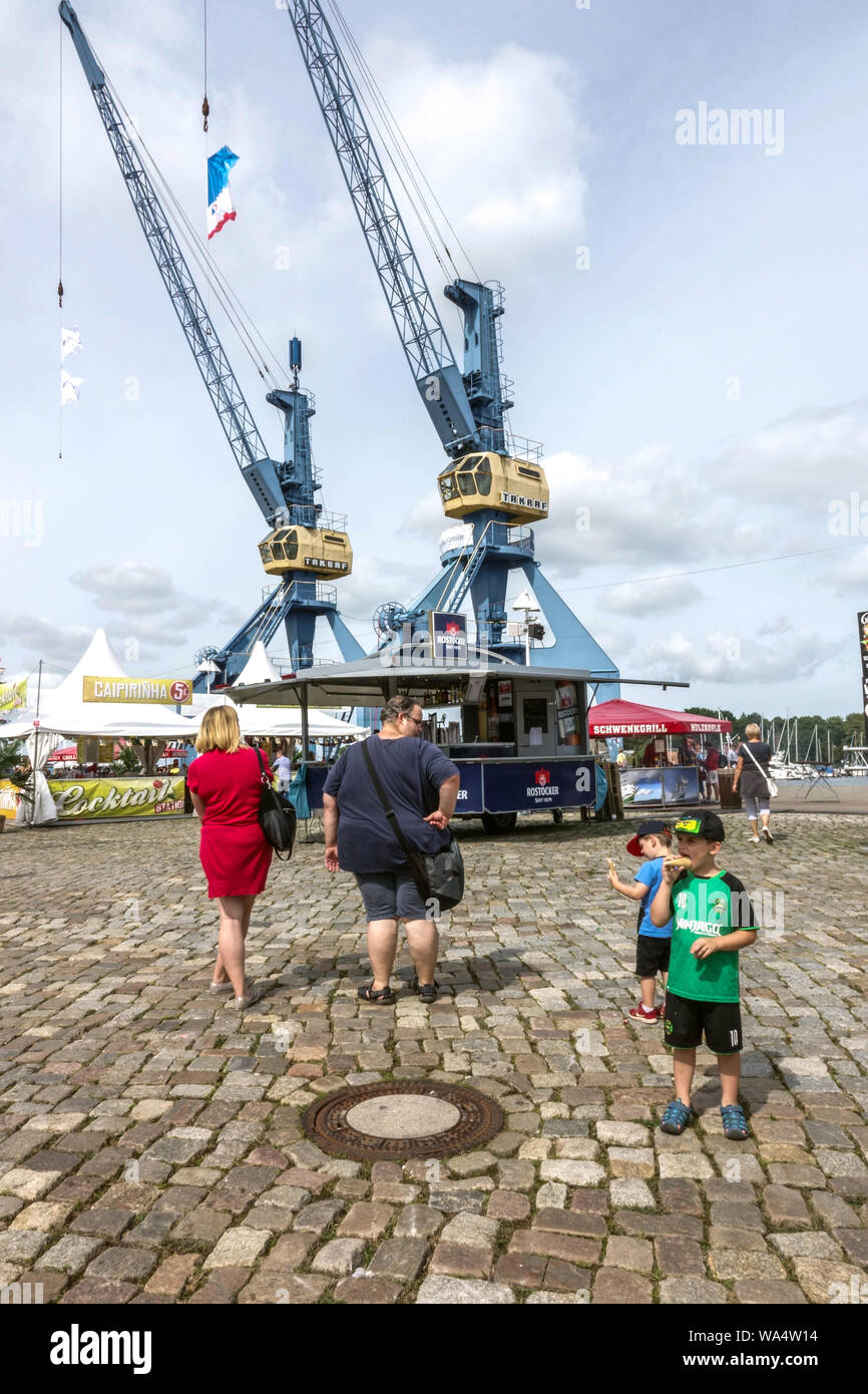Family on a trip in harbor, Rostock port Germany Stock Photo