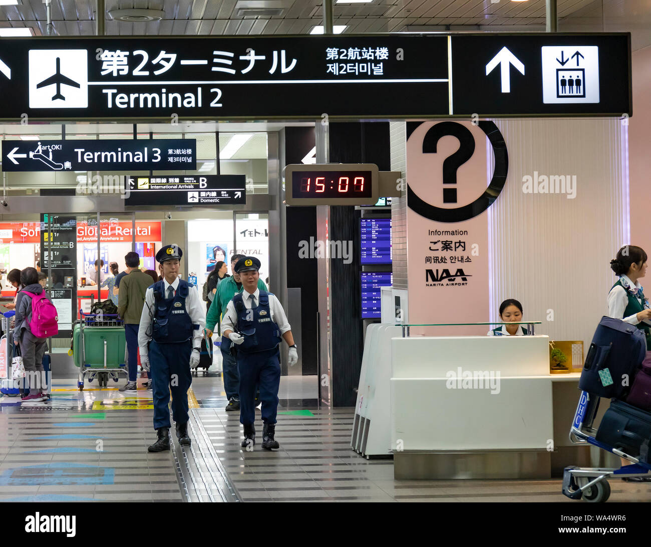 Narita, Japan - October 29th, 2018: Two policemen patroling the Narita airport, Japan Stock Photo