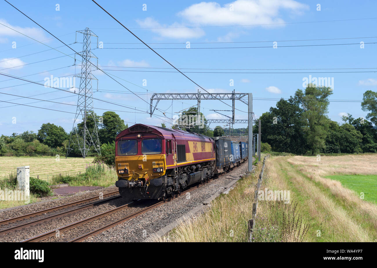DB cargo class 66 locomotive passing Nether Alderley (south of Alderley ...