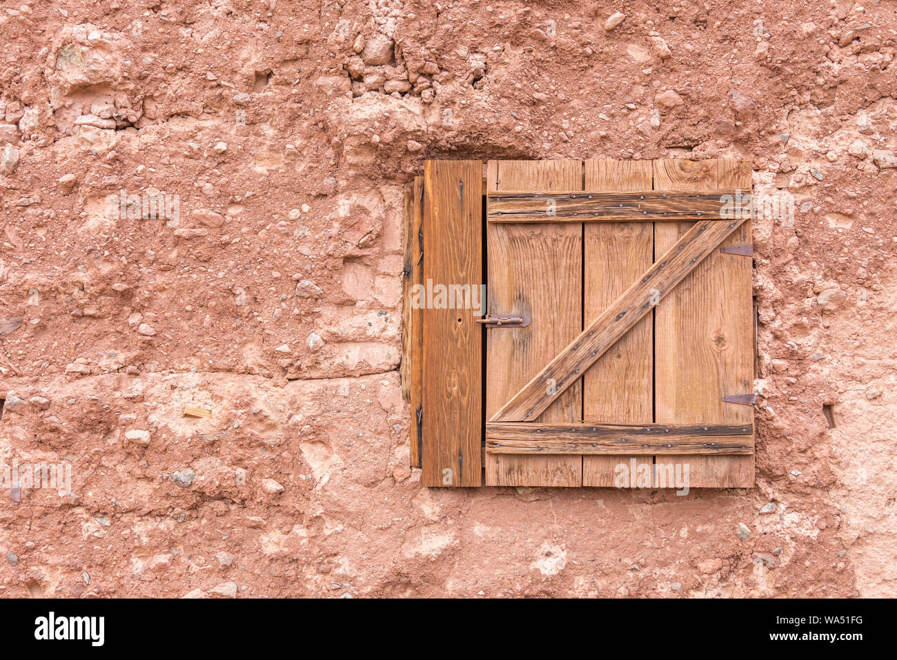 Old closed wooden window on a stone wall with copy space Stock Photo ...