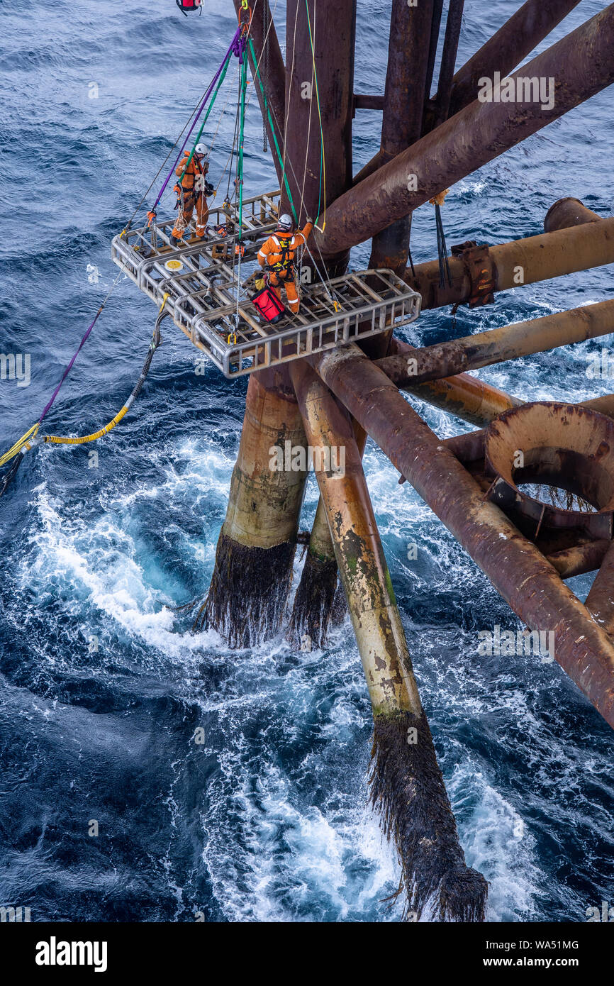working at height above the sea in the oil and gas industry Stock Photo
