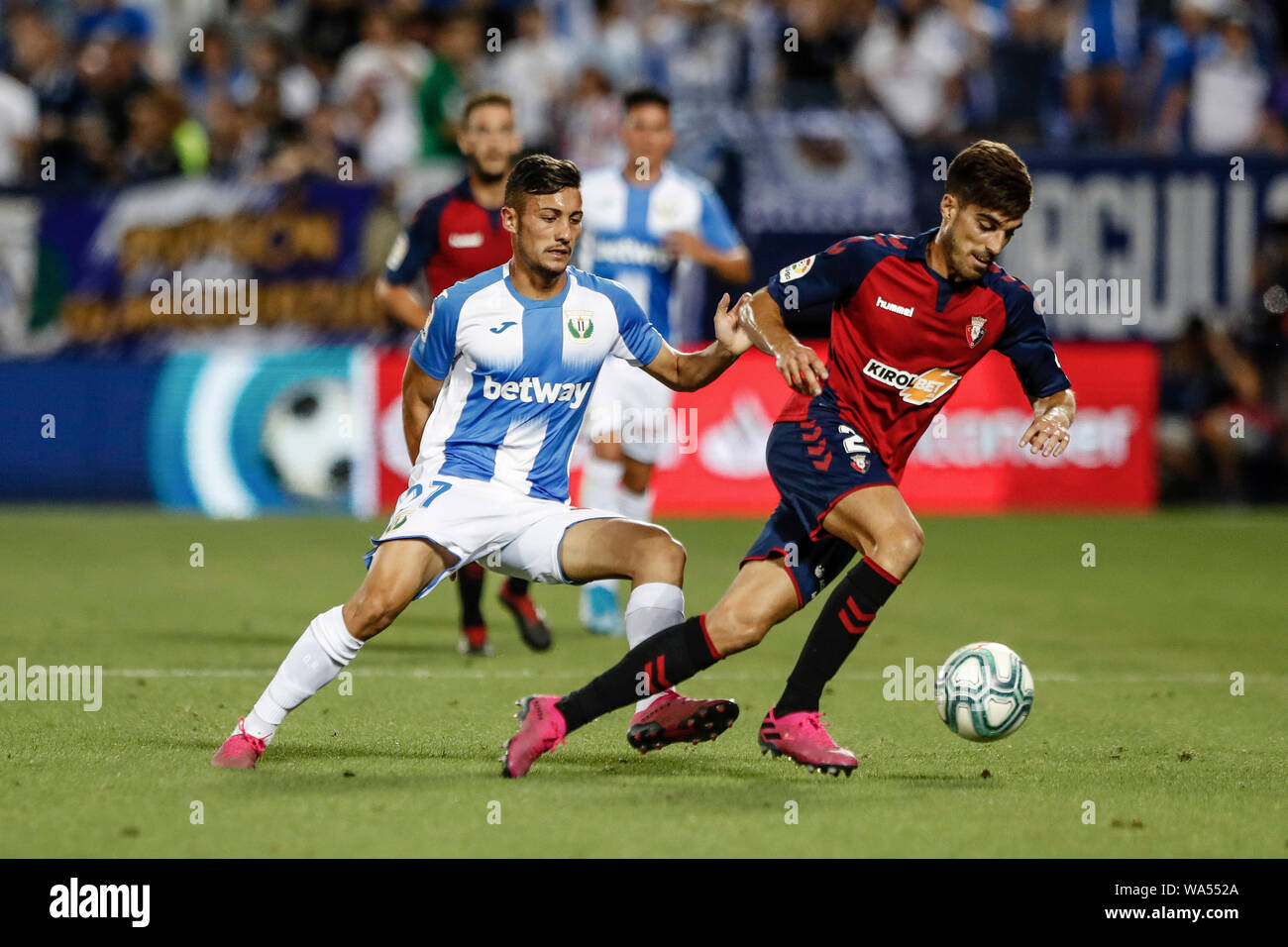 17th August 2019; Estadio Municipal de Butarque, Madrid, Spain; La Liga, Club Deportivo Leganes versus Club Athletico Osasuna; Nacho vidal (Osasuna) turns away as he controls the ball - Editorial Use Only. Stock Photo