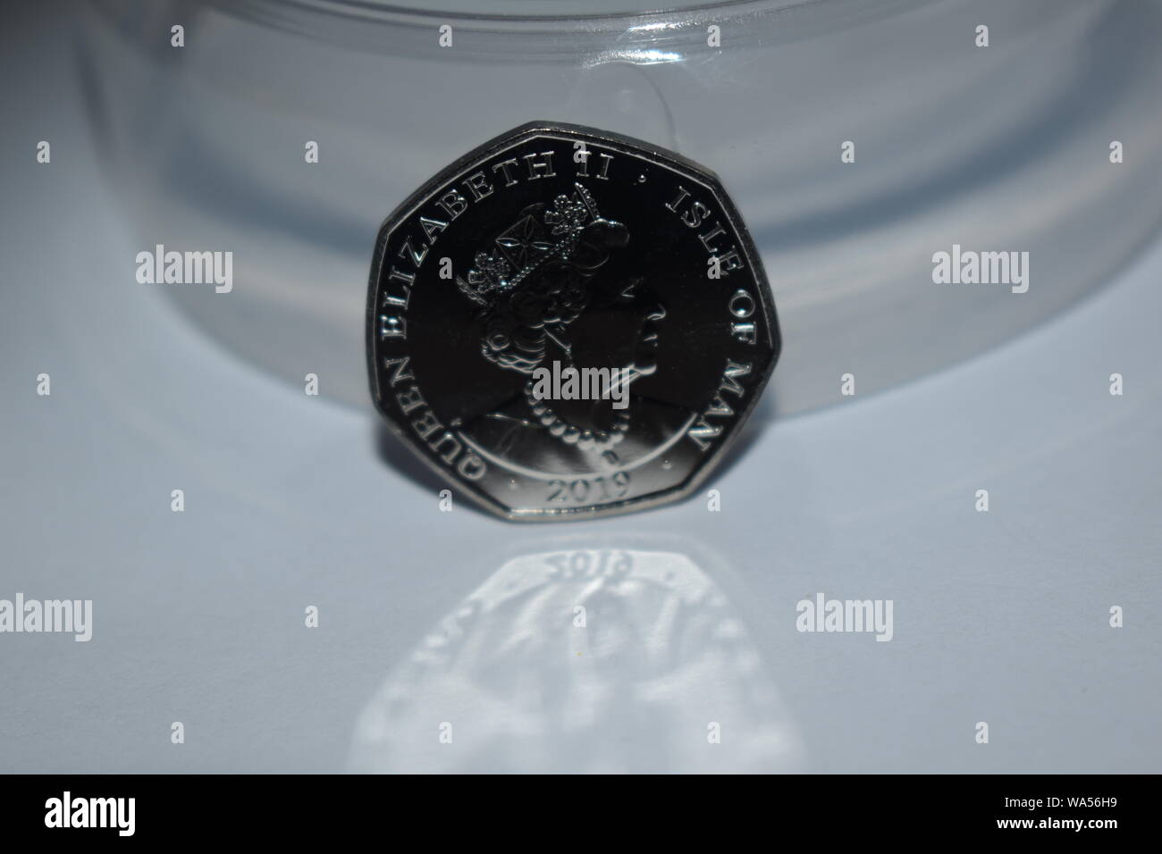 Brand new reverse side of the 2019 release by the Mint, of the new Peter Pan Fifty Pence. Queens head Set against a black and transparent background. Stock Photo