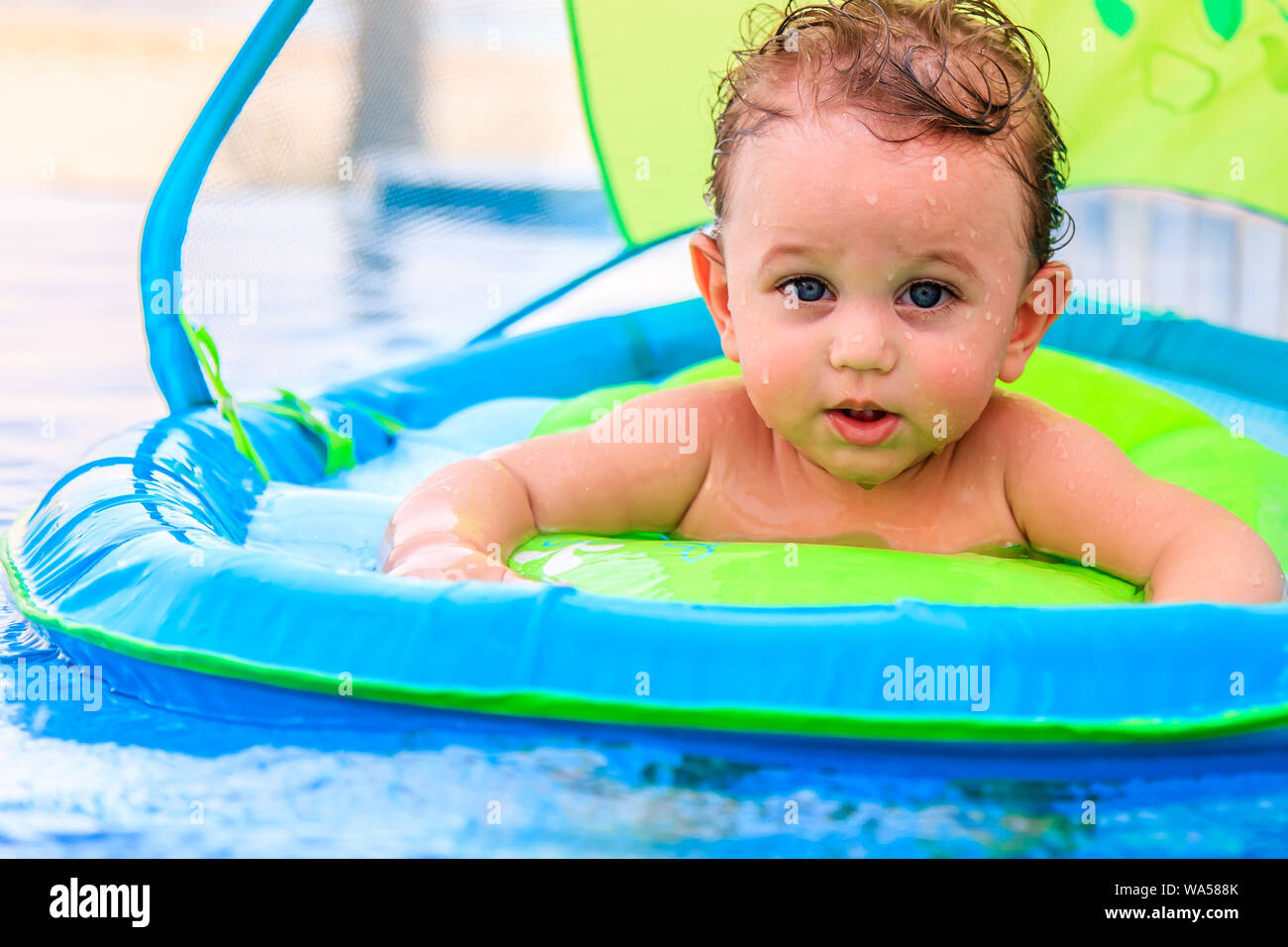 Baby floating pool hires stock photography and images Alamy
