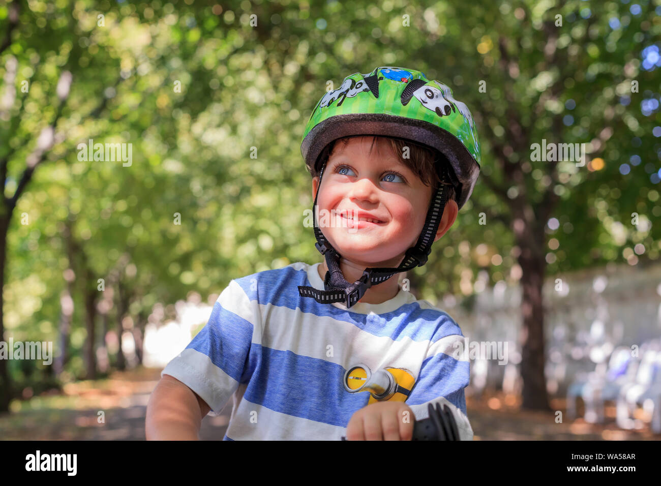 toddler wearing helmet Stock Photo Alamy