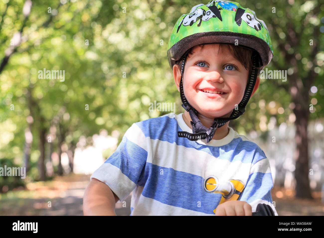 toddler wearing helmet Stock Photo Alamy