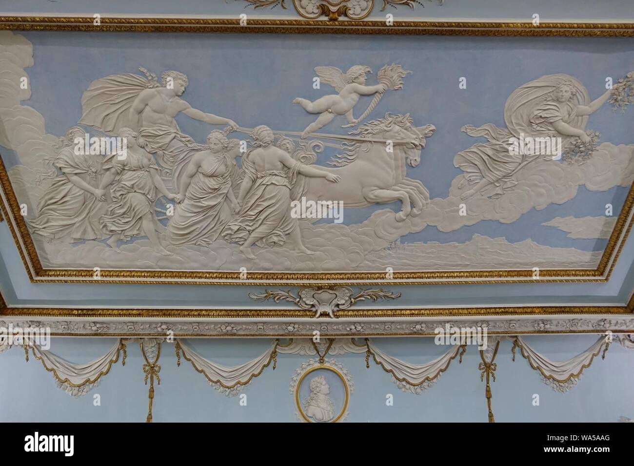 Dining Room ceiling decoration by Francesco Vassalli after Guido Reni's 'Apollo and the Hours', c. 1724-1763, plaster - Shugborough Hall - Staffordshire, England Stock Photo
