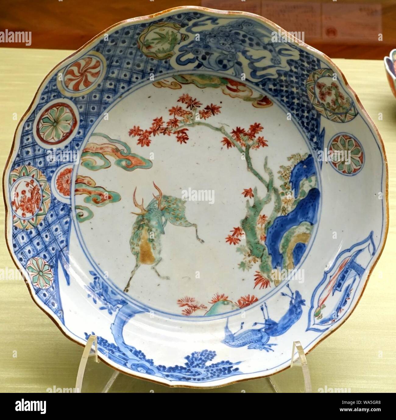 Dish with landscape and deer design, Imari ware, Japan, Edo period, 1600s AD, porcelain with overglaze enamel Stock Photo