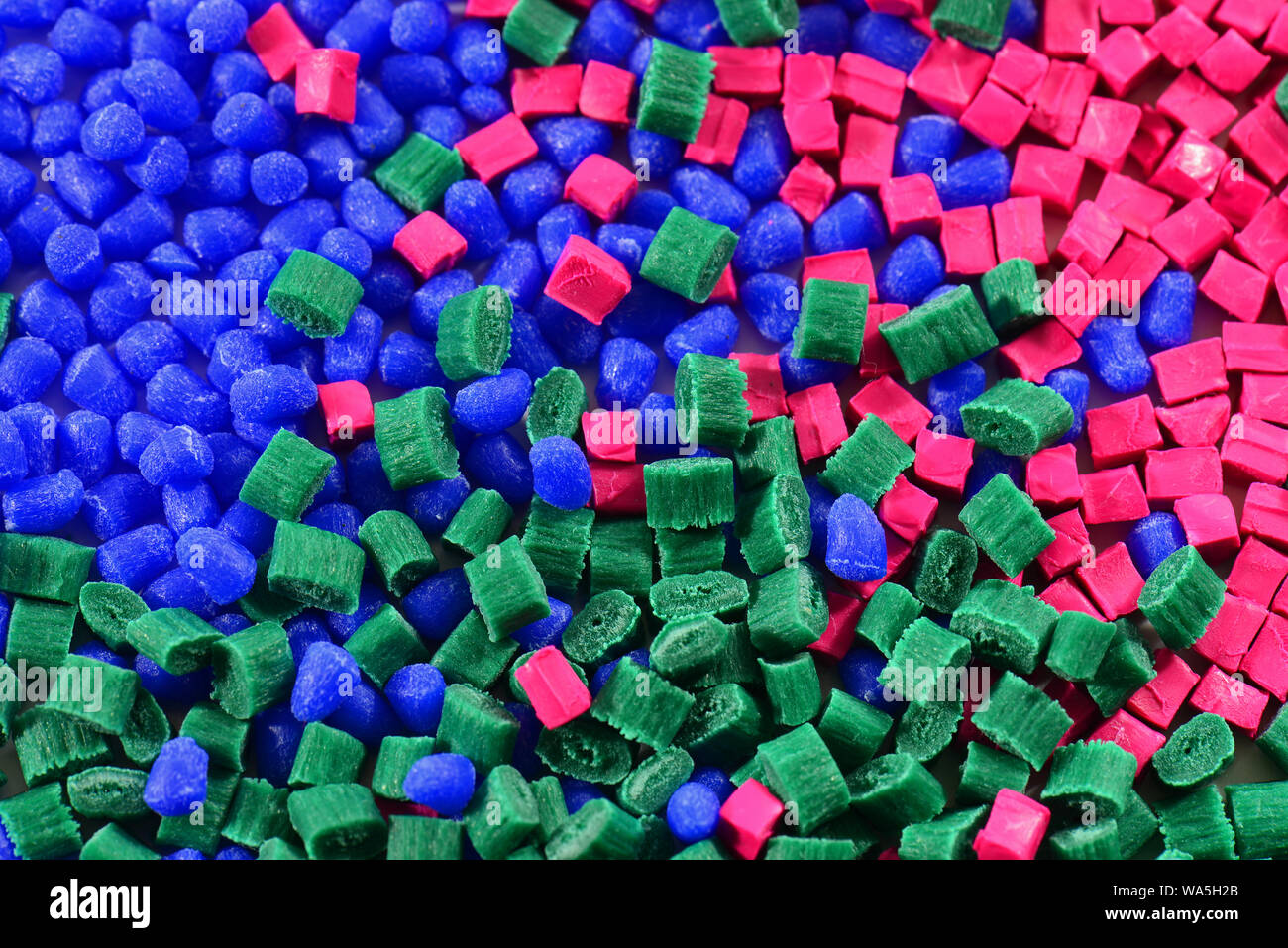 dyed polymer resin for injection moulding in laboratory Stock Photo
