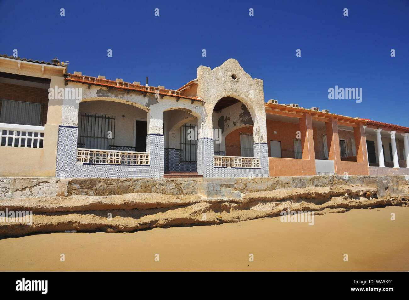 from flood destroyed houses at beach Stock Photo