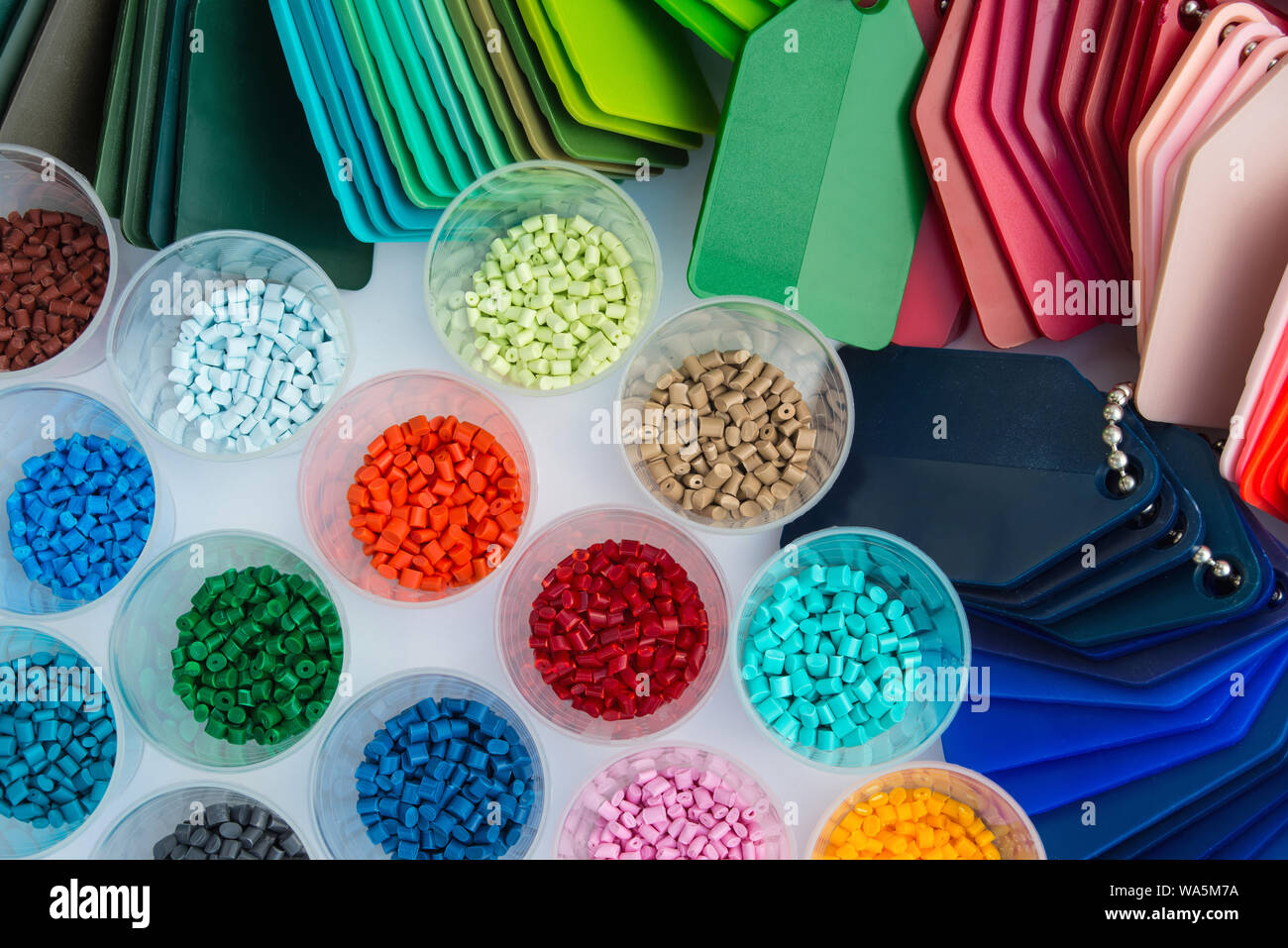 dyed plastic polymer resind granulates in laboratory Stock Photo