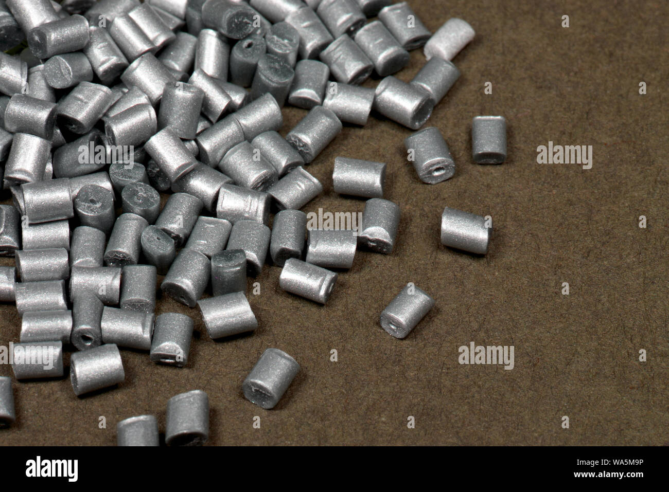 silver polymer resin granulate in lab Stock Photo
