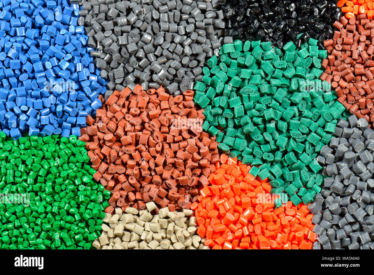 tinted plastic granulate for injection moulding process Stock Photo