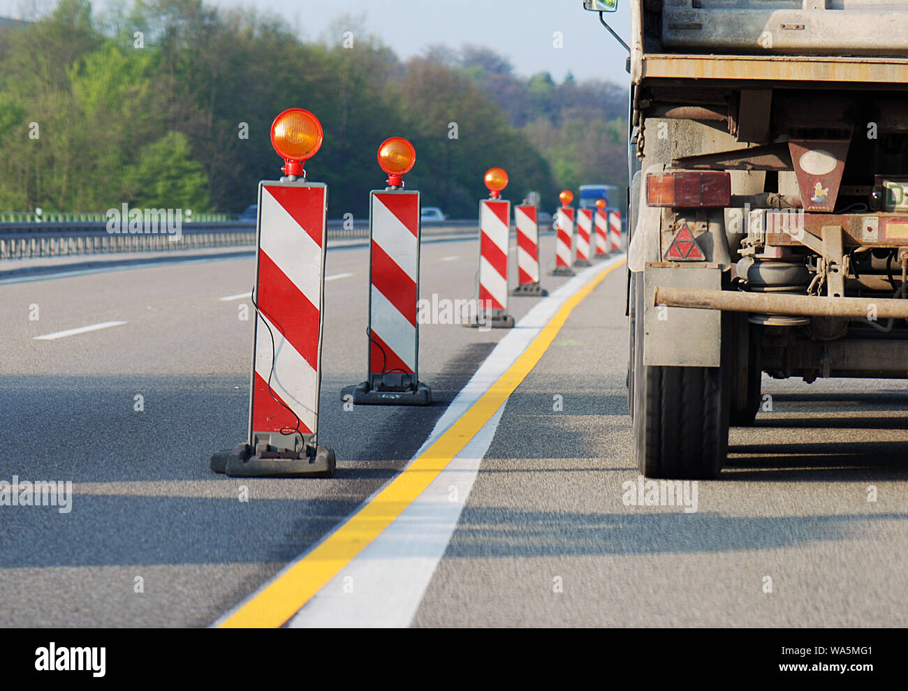 Dangerous situation with truck in roadwork lot on highway Stock Photo