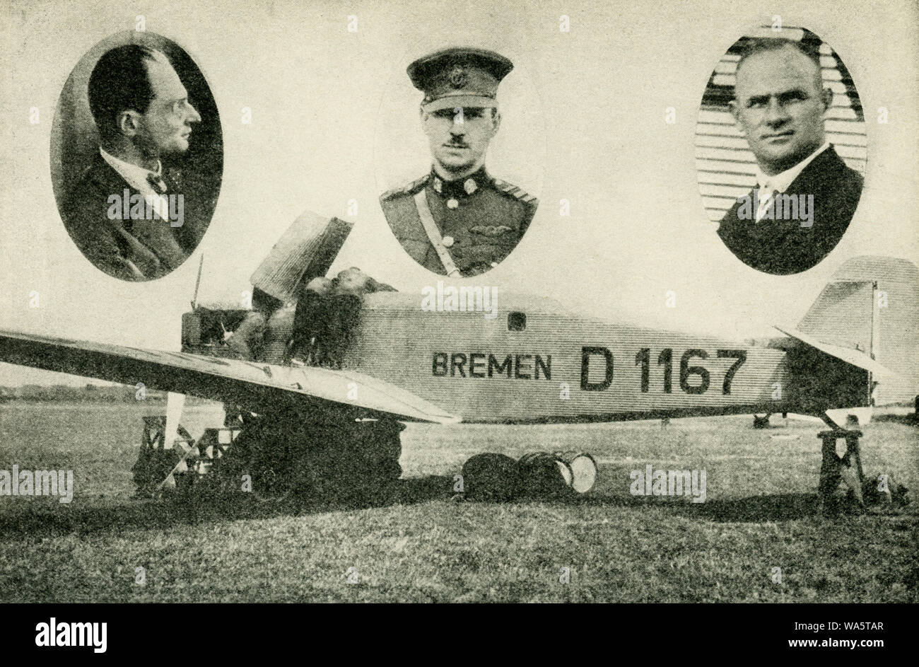 This photo dates to the 1920s. The caption reads: First to make the westward flight over the North Atlantic. These three intrepid airmen were the first to the hop from Europe to America. In the center is Major Fitzmaurice, of the Irish Free State Air Force; at the left is Baron von Huenefeld, German leader of the flight; at the right is Captain Koehl, chief pilot, and a bombing pilot with the German forces during the war, They hopped off from Dublin, Ireland, April 12, and brought the Bremen down safely on Greenly Island, in the Strait of Belle Isle, April 13, 1928. Stock Photo