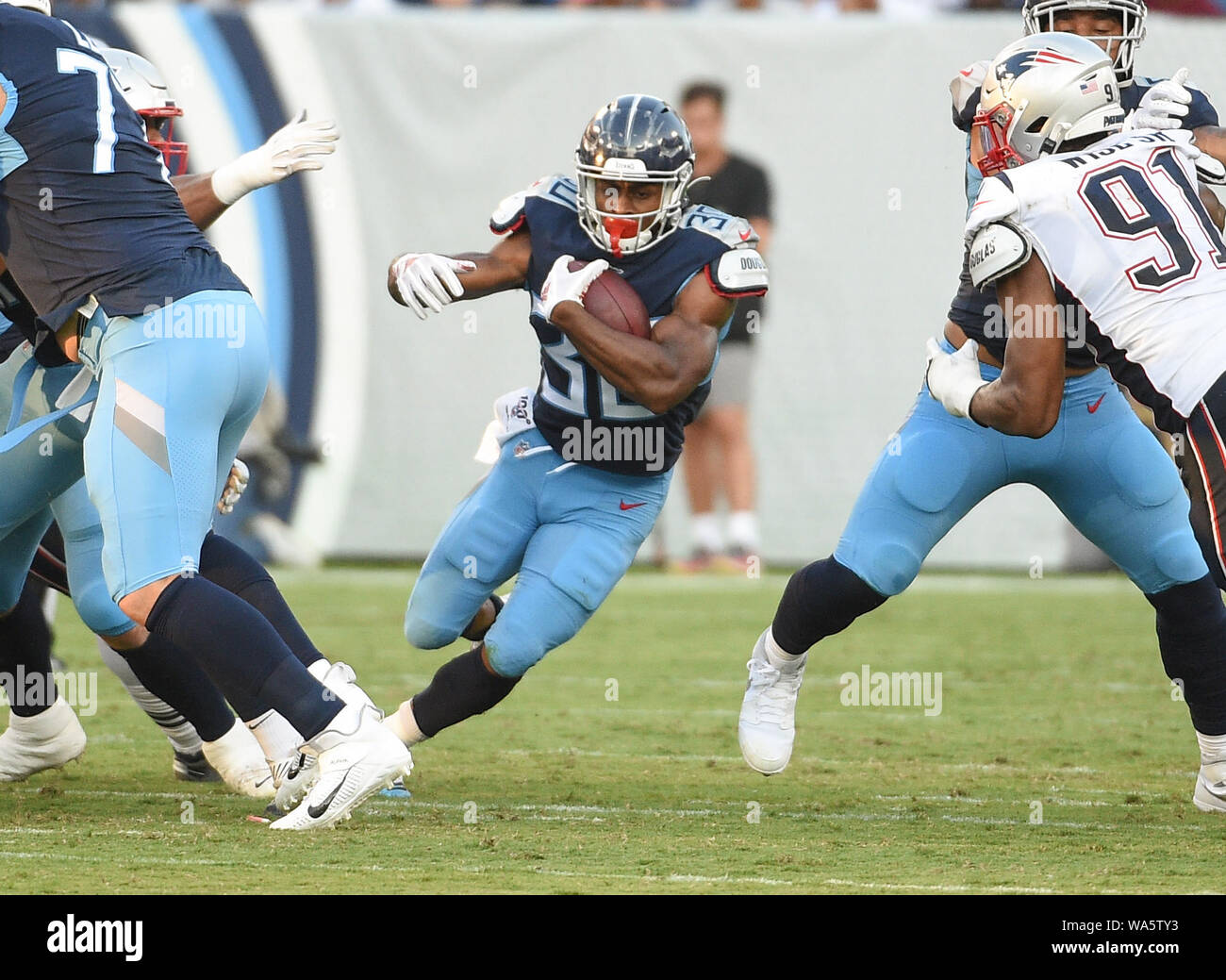 Aug 17 2019; Nashville TN, USA Tennessee Titans running back Jeremy McNichols (30) during the second quarter during a game between the New England Patriots and the Tennessee Titans and Nissan Stadium . (Mandatory Photo Credit: Steve Roberts/CSM) Stock Photo
