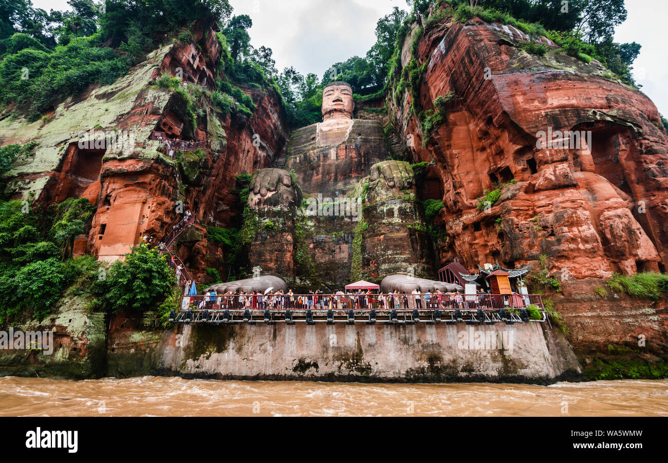 Wide angle view of Leshan Giant Buddha or Dafo from river boat in