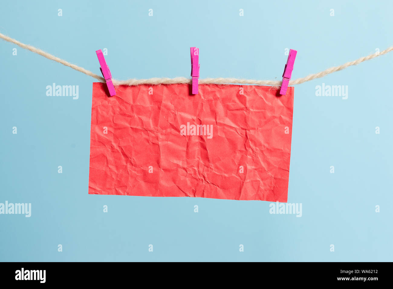 Clothesline clothespin rectangle shaped paper reminder white wood desk