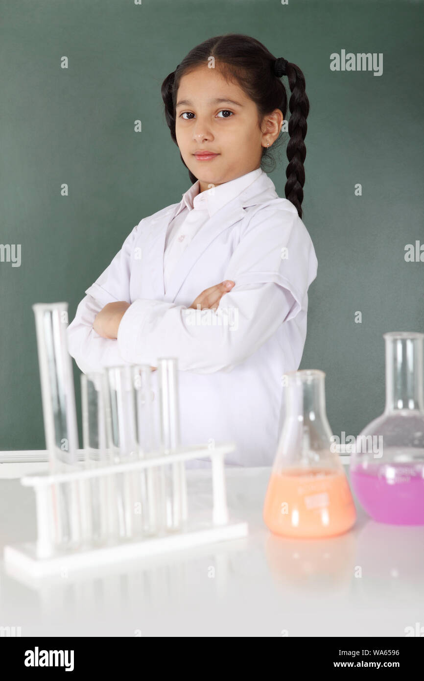 Schoolgirl experimenting in chemistry hi-res stock photography and ...