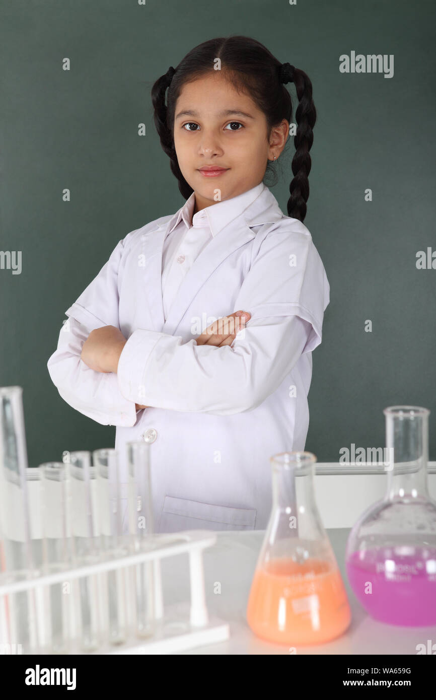 Schoolgirl experimenting in a chemistry lab Stock Photo Alamy