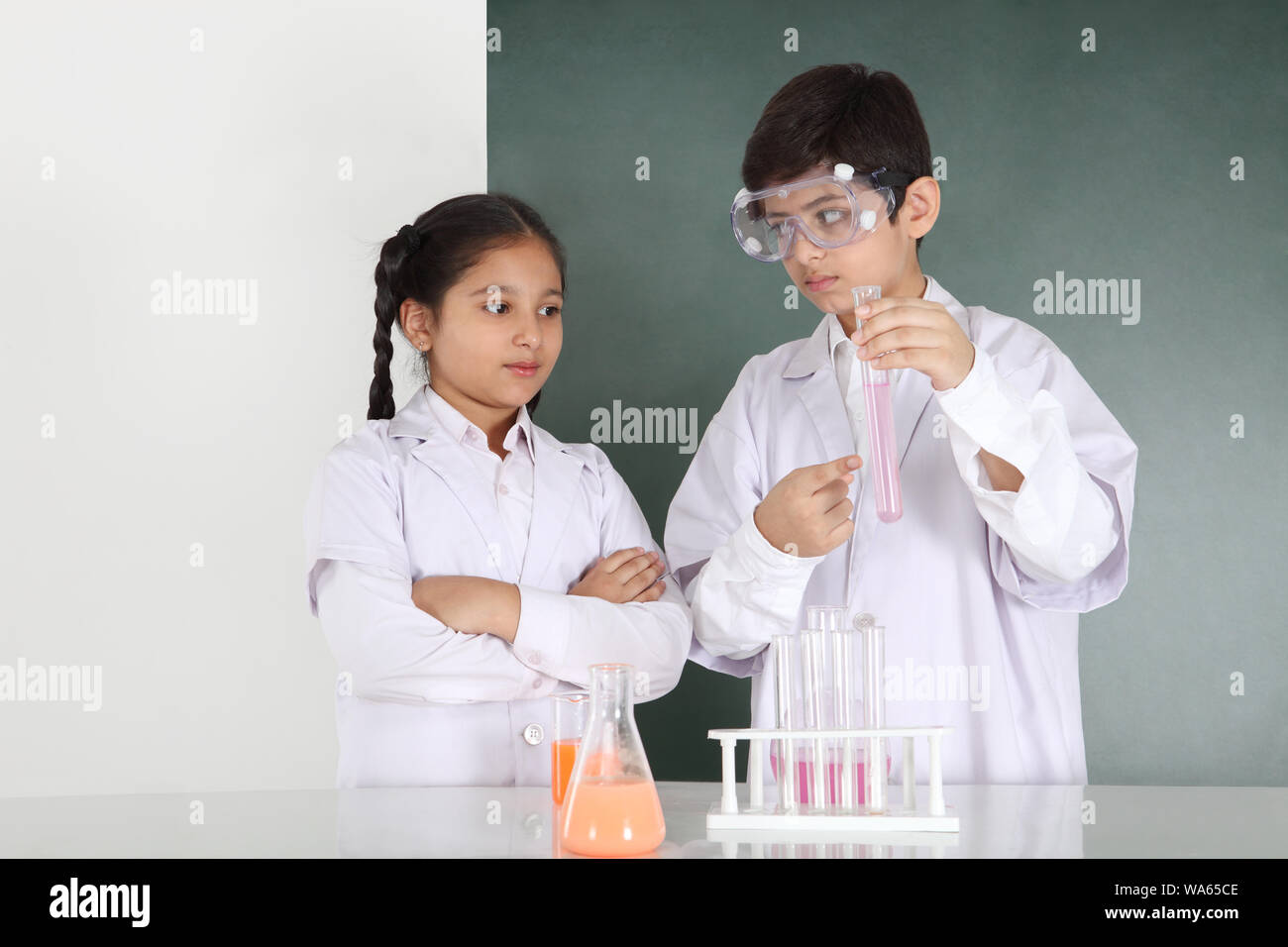 School students experimenting in a chemistry lab Stock Photo