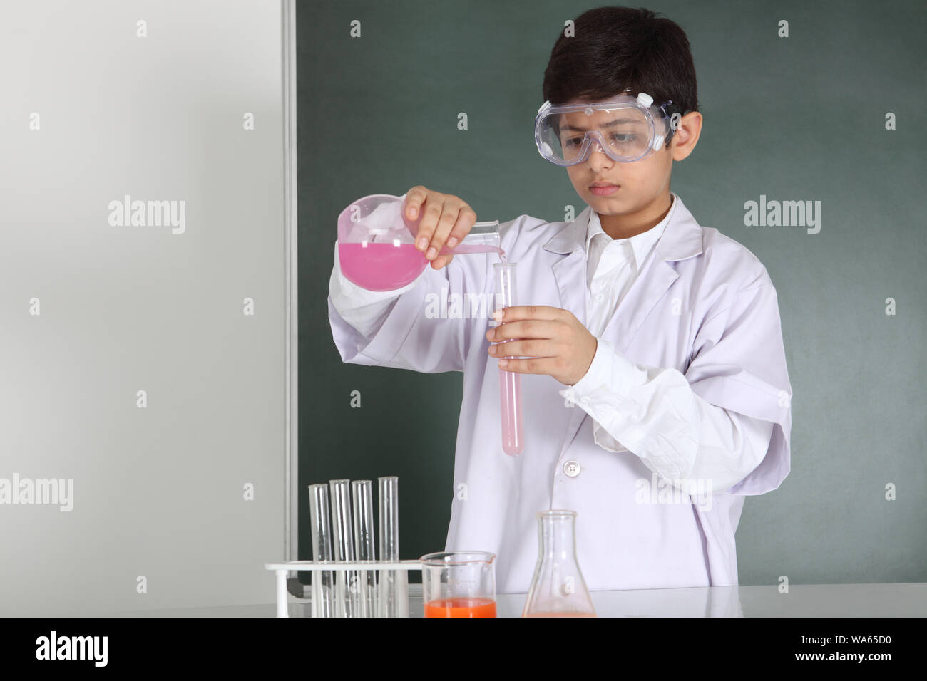 Student in science class experimenting hi-res stock photography and ...