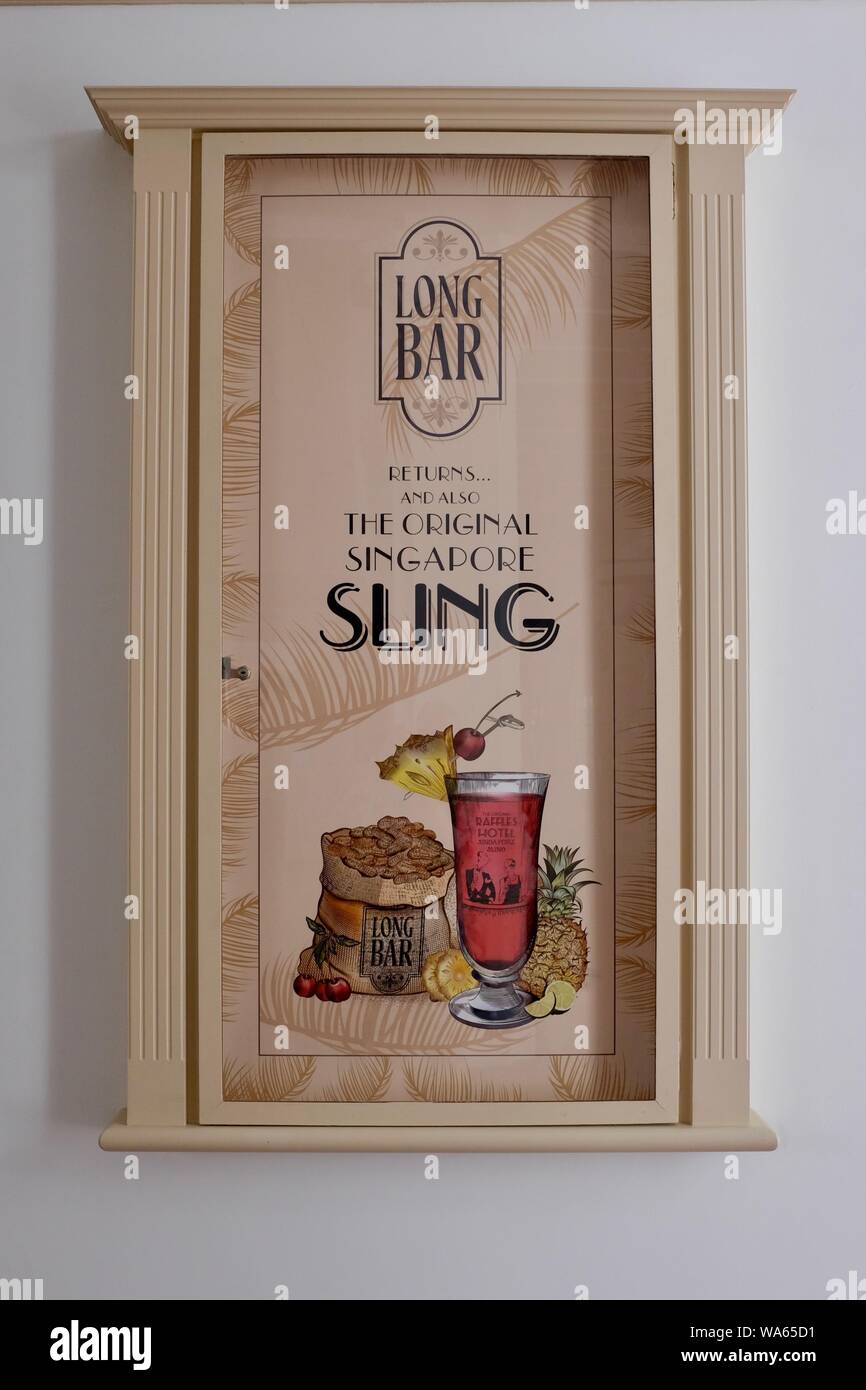 New poster announcing reopening of Long Bar, Raffles Hotel, Singapore on August 2019, home of the iconic Singapore Sling cocktail after restoration Stock Photo