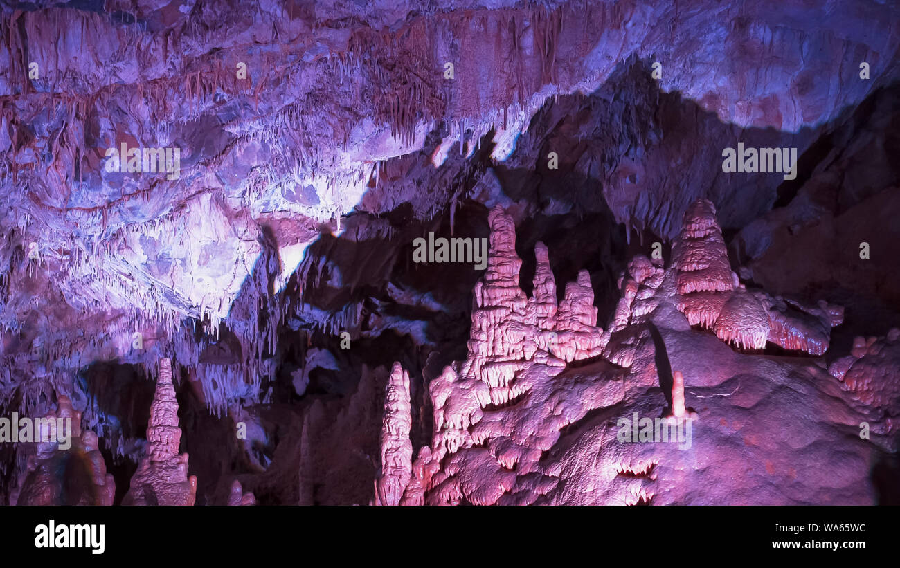 wide view of limestone formations in the paradise room of lewis and clark cavern Stock Photo