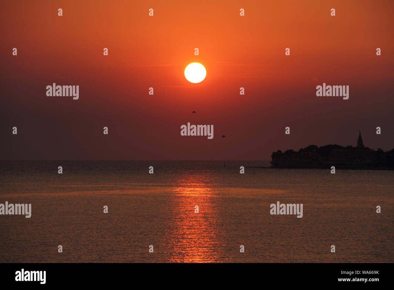 sunset on the coast of Croatia Stock Photo - Alamy