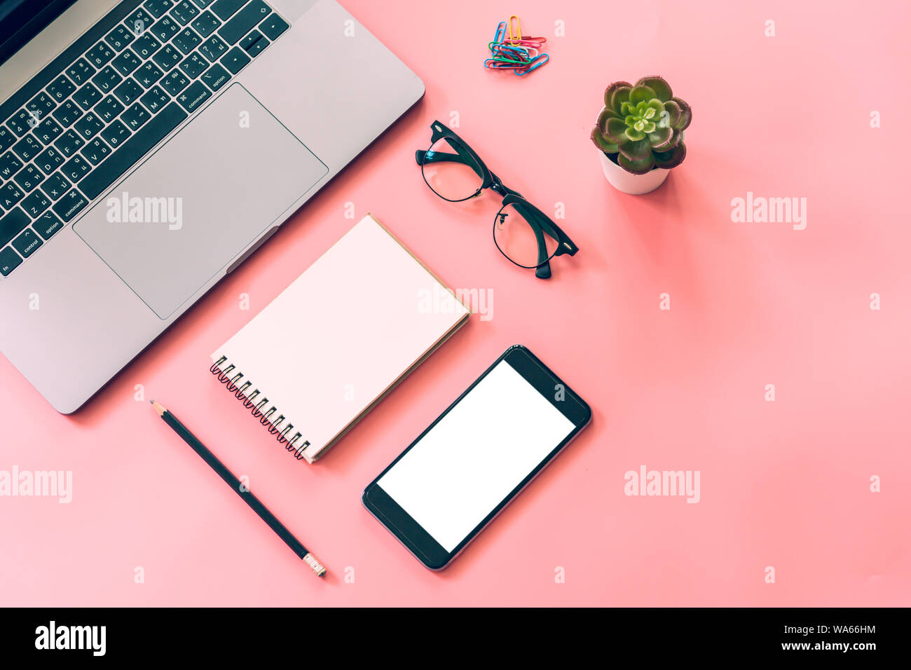 Flat lay design of workspace desk with laptop, blank notebook ...