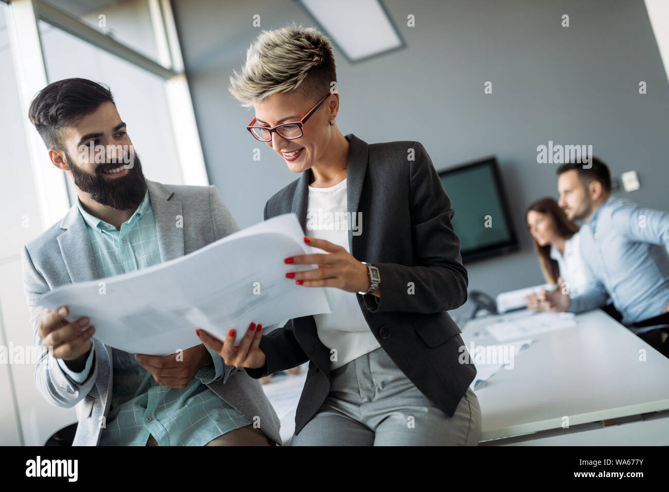 Businessman putting forward his suggestions to colleagues. Startup business team on meeting Stock Photo