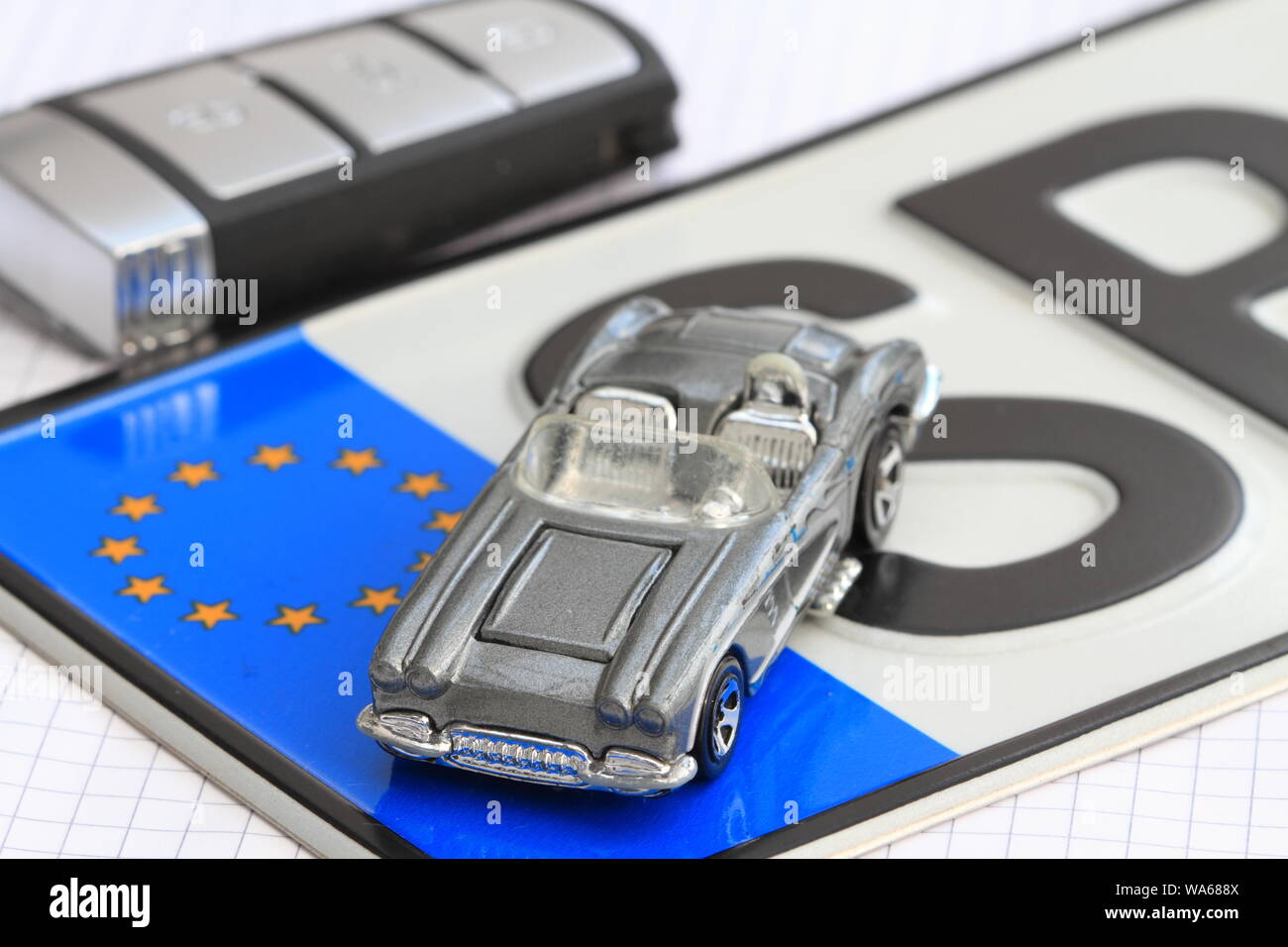 License plate with a car key Stock Photo