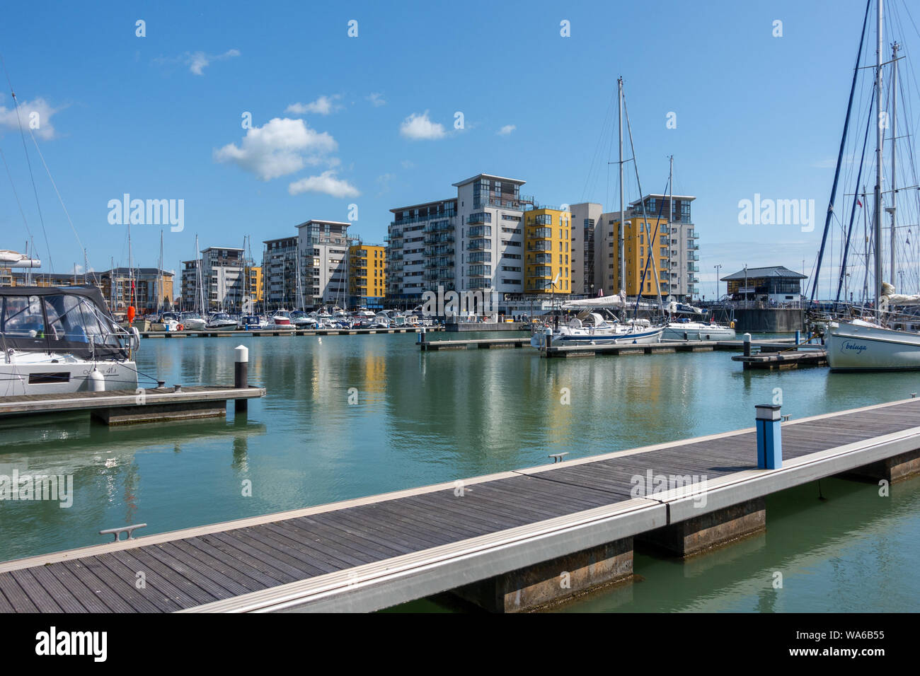 Moorings, boats and apartments, Sovereign Marina Harbour, Eastbourne, East Sussex, England,UK Stock Photo