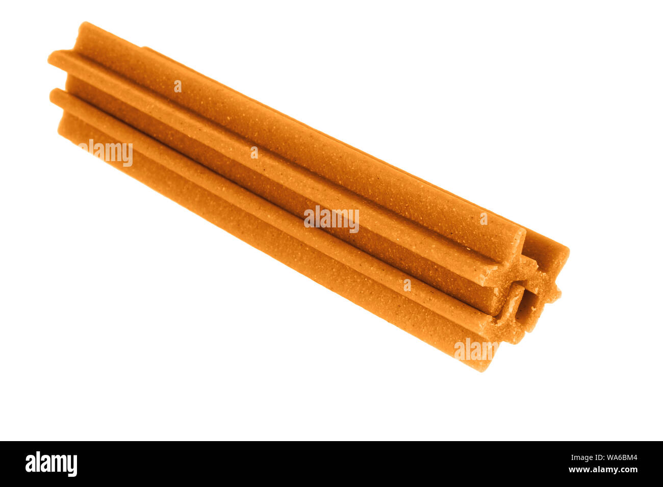 tendon sticks for gum massage in dogs isolated on white Stock Photo