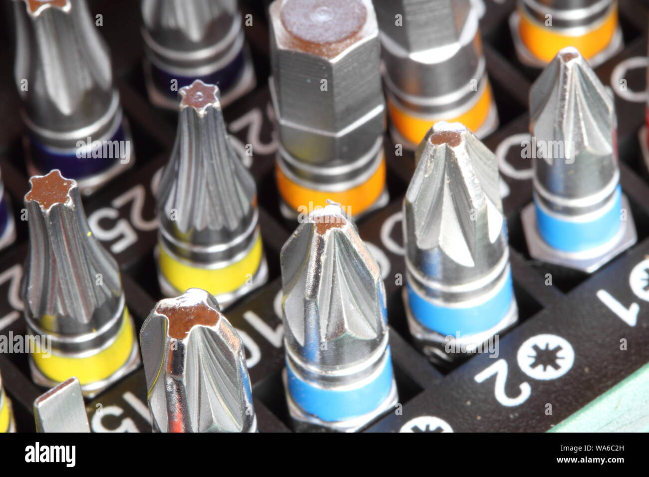 different colored bits for the cordless screwdriver Stock Photo Alamy