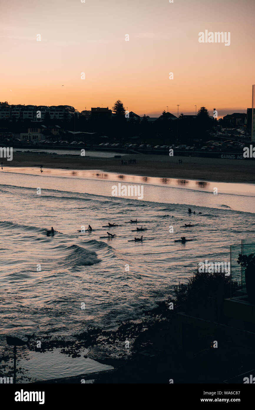 Warm sunset over Bondi Beach on a cold winter afternoon. Stock Photo