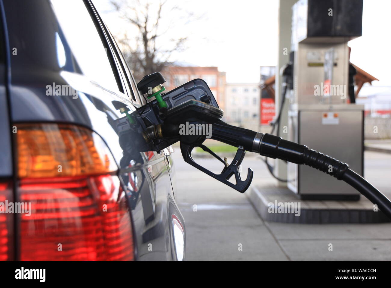 refuel a car at the gas station Stock Photo Alamy