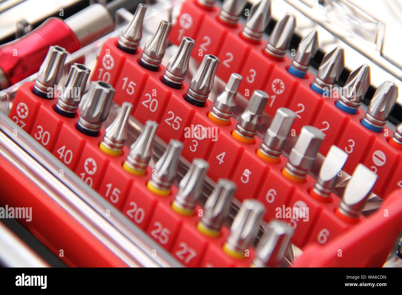 different colored bits for the cordless screwdriver Stock Photo Alamy